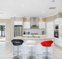Central Gold Coast Large Modern Elevated Home - Accommodation Melbourne