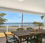 Bellevue overlooking serene Lake Woolumboola - Accommodation Melbourne