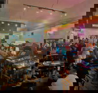 Token Arcade  Kitchen - Accommodation Melbourne