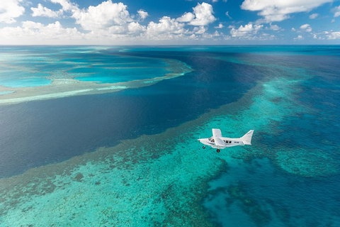 Great Barrier Reef Scenic Flight And Ocean Rafting Whitehaven Beach Day Trip - Accommodation Melbourne 3